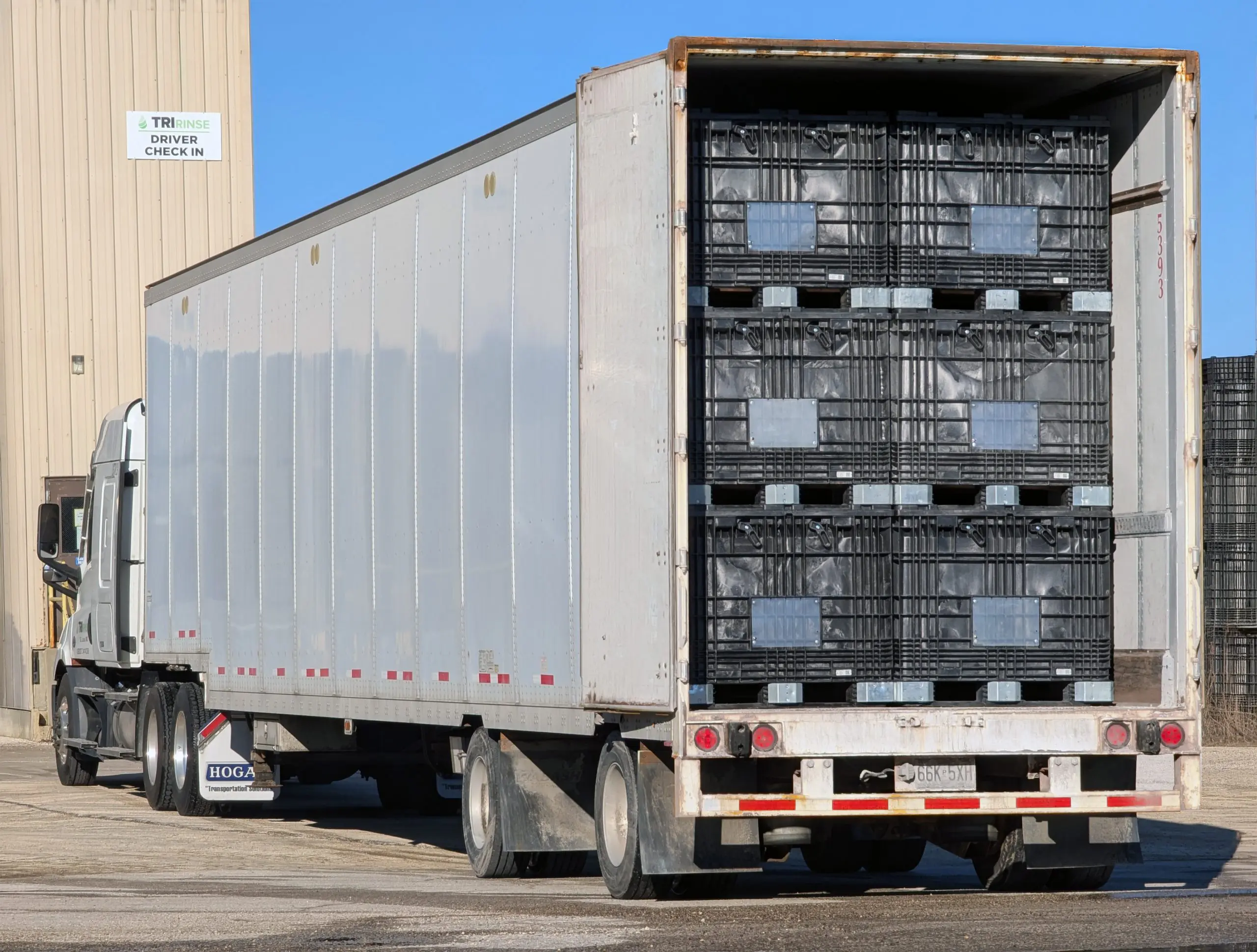TriRinse jumbo trailer with seed boxes.